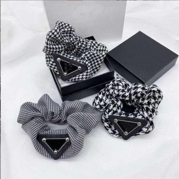

uxury brand letter women hair rubber bands fashion plaid hair soft touch lady hair ring indoor outdoor elastic hair jewelry