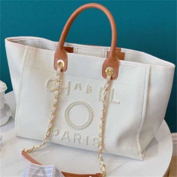 

50% off luxury women's classic canvas beach bag large capacity small chain packs big shopping handbags fasf