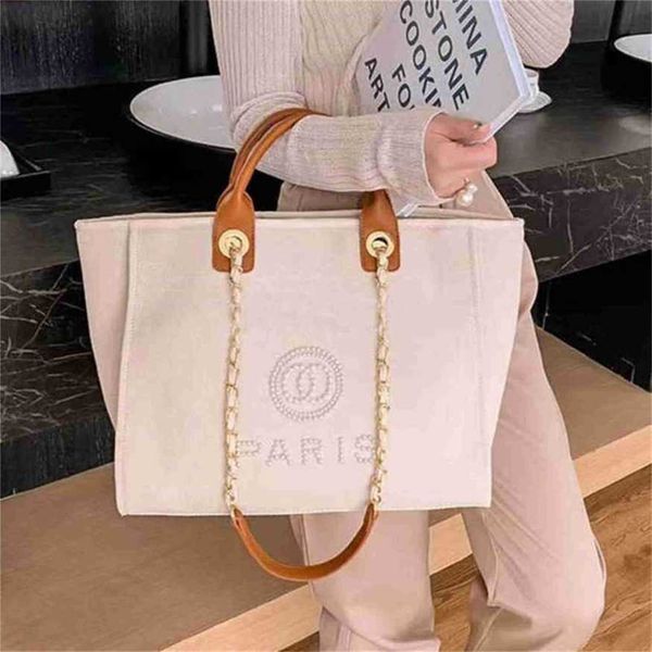 

70% off classic canvas fashion label pearl beach bag portable large capacity luxury big handbags ladies backpack q316
