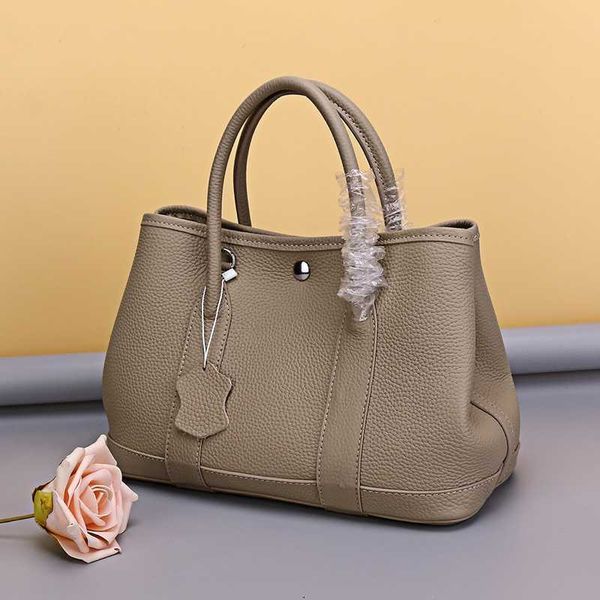 

garden party designer totes new women's bag party bag genuine leather women's bag layer cow leather carrying bag small crowd high-