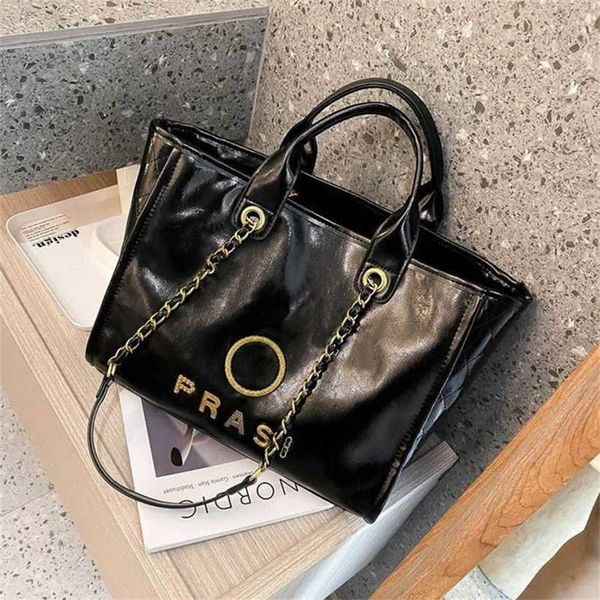 

classic luxury handbags beach bags brand metal badge tote bag small evening handbag female capacity large leather one shoulder backpack 50%