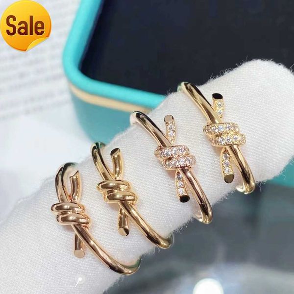 

18k gold knot ring fashion designer ring men and women wedding gift factory wholesale and retail, Slivery;golden