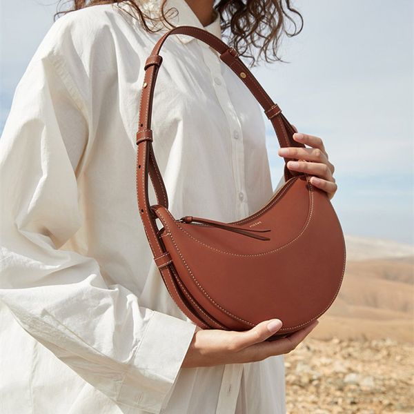 

the new crescent underarm bag is a niche one-shoulder cross-body bag for women