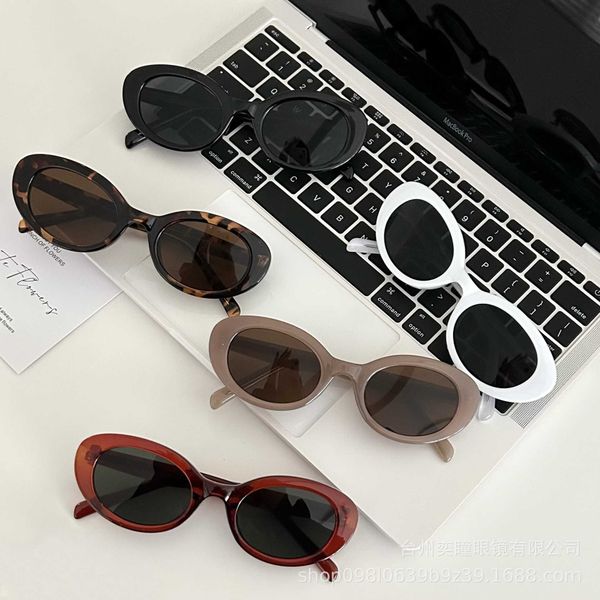 

2023 new oval sunglasses men's net red leopard hip hop small frame sunglasses women's trampody, White;black