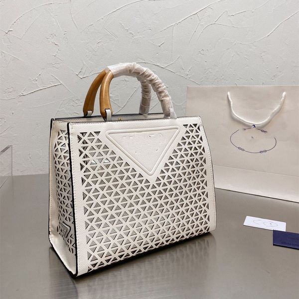 

spring and summer new openwork shopping bag high-fashion tote bamboo hand-held large-capacity women's bag