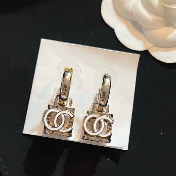 

two letter cutout charm earrings. 18k gold-plated brass material chinese palace hollow style luxury earrings designer for women. fashion 925, Golden