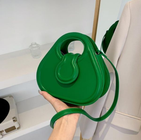 

fashion design korean version bag woman 2023 new spring pure color texture handbag woman simple shoulder bag trend