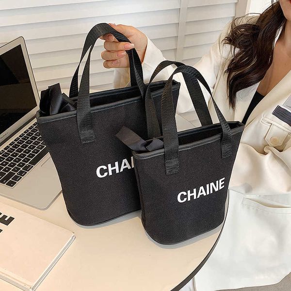 

canvas letter makeup bag travel portable storage bag large capacity portable bucket bag