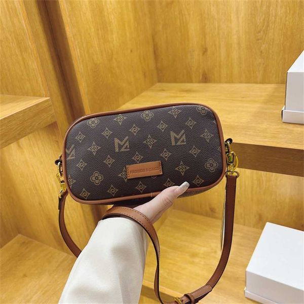 

designer handbag store 60% off women's early autumn new diagonal camera sports large-capacity printed shoulder bag fashion