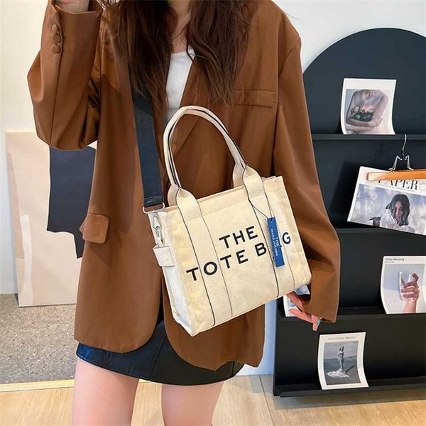 

2023 bags clearance outlets women's new large capacity portable tote personality letter shoulder leather fashion crossbody bag women