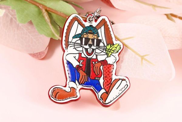 

2023 new boutique male and female mascots leather luxury keyring, Silver