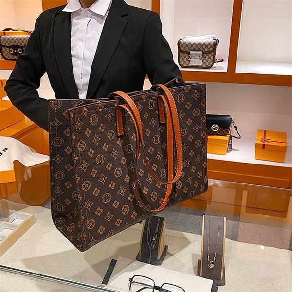 

designer handbag store 60% off high sense large capacity small crowd versatile commuter bag women new fashion autumn and winter texture tote