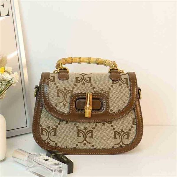 

2023 bags clearance outlets stuff sacks purse bamboo bag portable leather semi-circular saddle female messenger 2023 new flower one shoulder