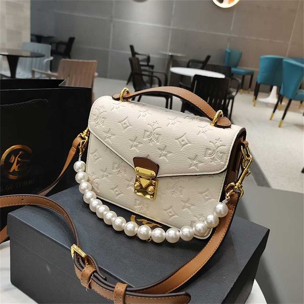 

designer handbag store 60% off woman embossing much interlayer handbag messenger girl purses ladies bag with pearl strap