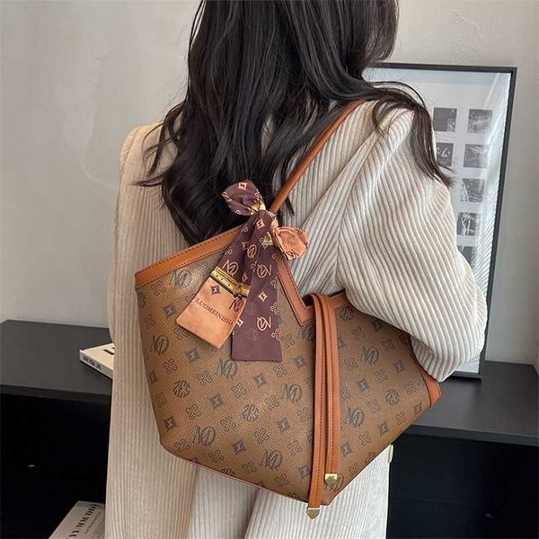 

2023 bags clearance outlets high sense printing large capacity versatile commuting basket bucket women's new fashion shoulder bag