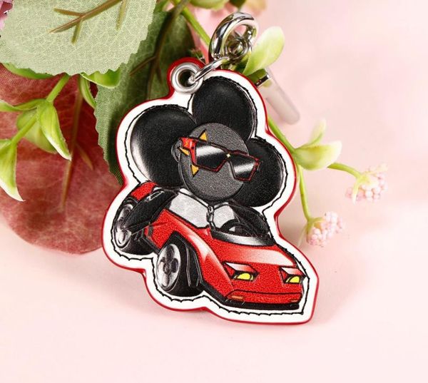 

2023 new fashion boutique male and female mascots leather luxury keyring, Silver