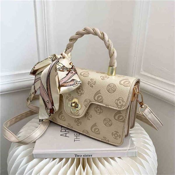 

luxury designer 2023 new women's handbag this year's popular women's red portable solid color bow candy shoulder messenger ba