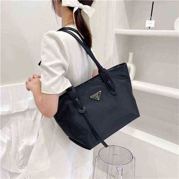 

12% off handbag 2023 new bag triangle classic canvas shoulder large capacity tote shopping nylon portable