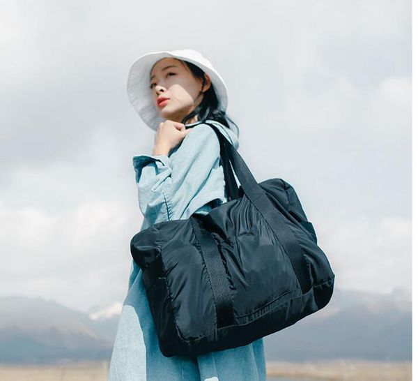 

55cm luxurys designers bags fashion men women travel duffle bag leather luggage handbags large contrast color capacity sport 665889634000