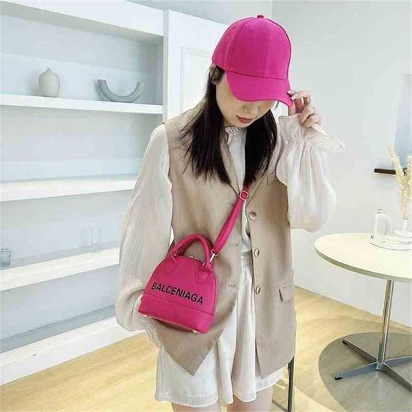 

36% off handbag 2023 new bag women's women simple letter printing candy color hand-held exotic shell