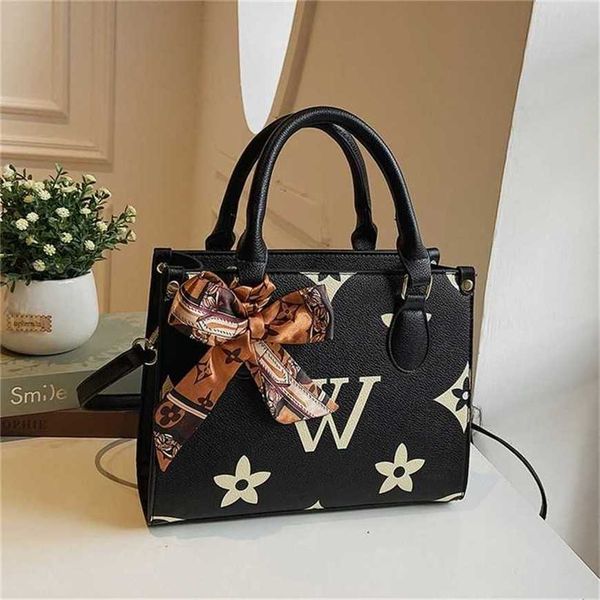 

26% off handbag 2023 new bag women's large capacity portable tote minority french shoulder style texture messenger