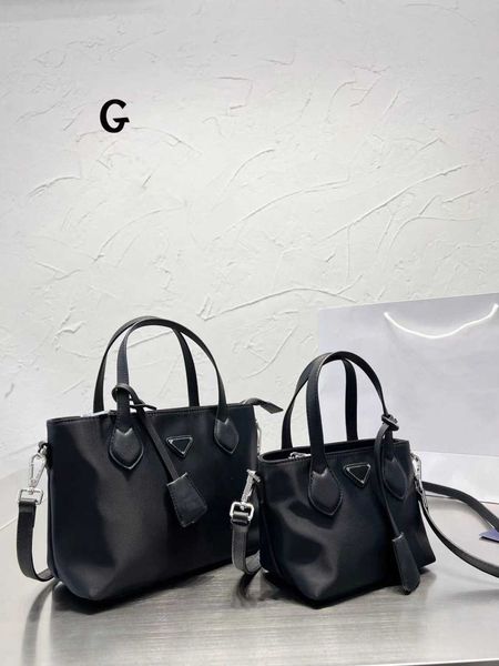 

prads designer luxury prade bags for womens pink strap crossbody handbags vintage paris plaid totes bag purses shoulder pravda mens multicol