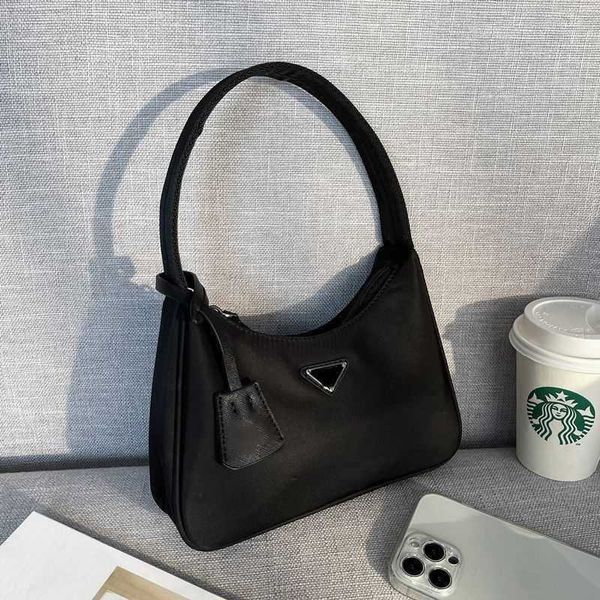 

prads designer luxury prade bags for womens pink strap crossbody handbags vintage paris plaid totes bag purses shoulder pravda mens multicol