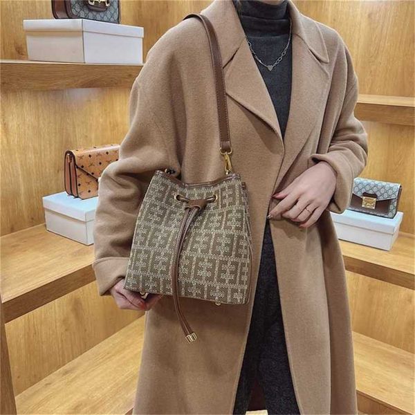 

designer handbag store 70% off handbag women's autumn and winter bucket version personality trend single commuter messenger bucket sale