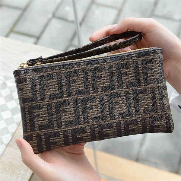 

2023 online 70% off bags hand wallet women's long personalized zipper mobile phone large capacity multi card wallet sales, Red;black