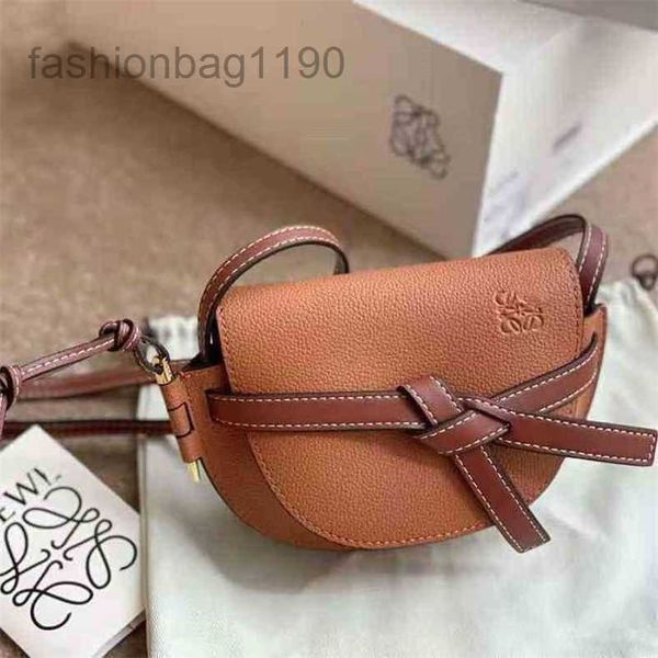 

2023 bags designers gate loews crossbody handbags litchi grain cowhide oblique span women's niche design mini bow saddle leather cg5q
