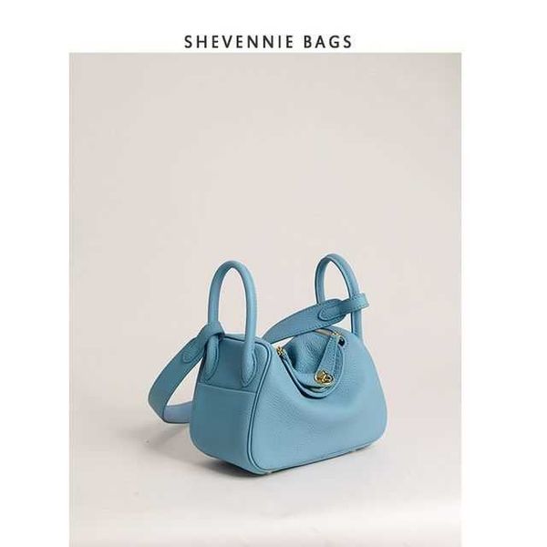 

designer herme lindi bags online outlet shevenie 2023 summer buckle lychee head layer cowhide pillow bag small