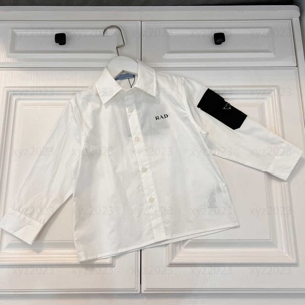 

2023 kids clothing baby shirt child blouses spring and autumn pockets on sleeves lapel tide goods new listing size 100-160 cm, White;black