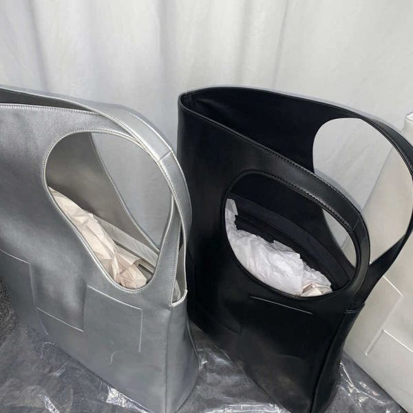 

fashion large capacity irregular design ladies handbag underarm bag