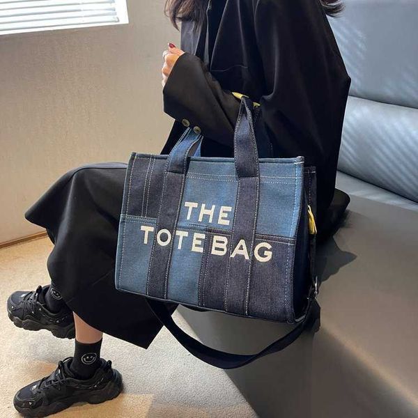 

bag women's 2023 new embroidery letter handheld crossbody bag denim blue splice tote bag