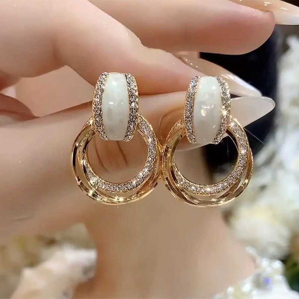 

charm high-grade temperament inlaid with diamond white 2023 new fashion light luxury minority design multi-layer ring earrings female, Golden