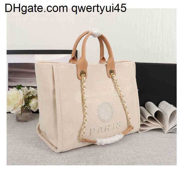 

qwertyui45 totes new designer handbags pearl beach bag canvas portable high-capacity fashion trend women bags y220708 021723h