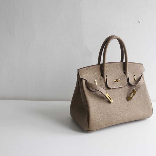 

55%off design fashion classic leather bag lock 30cm cowhide portable women's crossbody bags for women