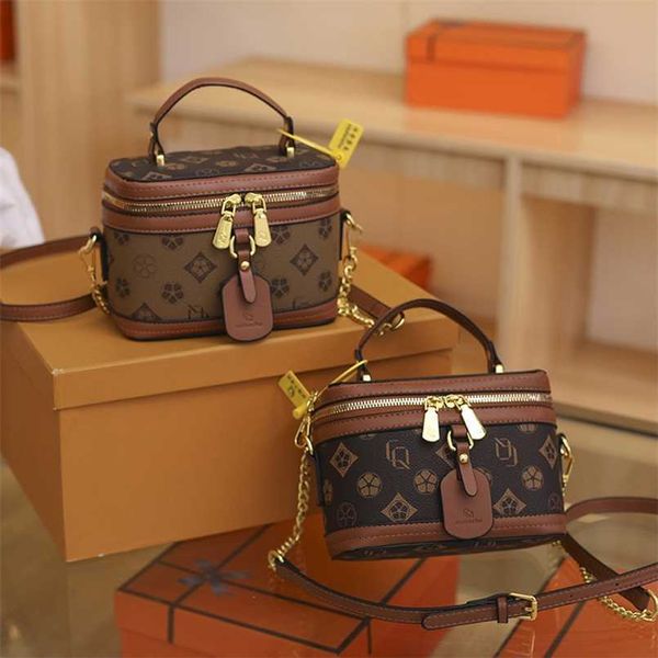 

hand-held cosmetic bag for women 2023 new style luxury flower one-shoulder messenger bag online live broadcast of early