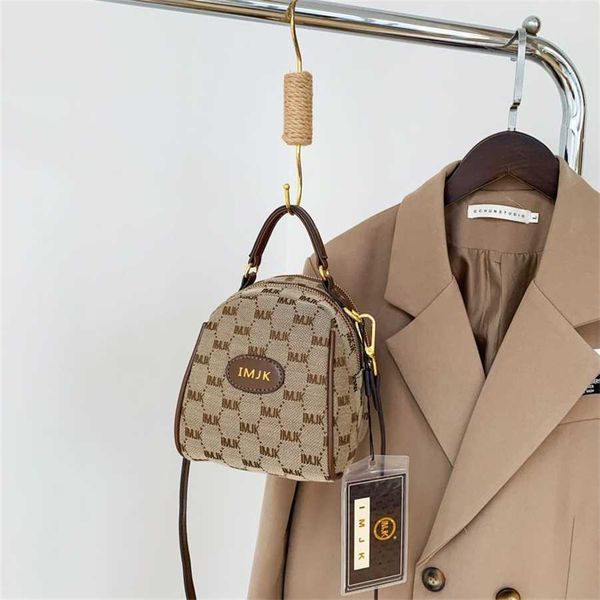 

evening bags 2023 new canvas women's designer mobile phone mini bucket bag tibet special chain purses