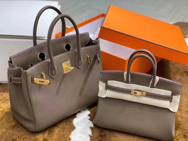 

women's bag 2023 trend luxury designer layer cowhide leather women's hand one shoulder messenger high bag 50%off black white purse