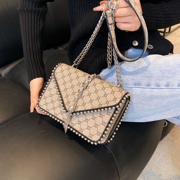 

bag women's women's shoulder rivet chain small square tassel bag one-shoulder simple messenger handbag purse