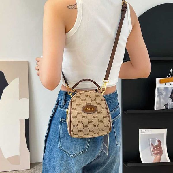 

design small bags new canvas women's bag trend mobile phone mini bucket tibet special chains purse outlet clearance sale