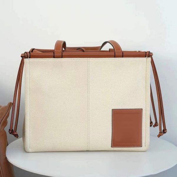 

high capacity shopping tote loeve bag luxurys designer fashion shoulder canvas pochette womens mens purses crossbody beach handbags lady bro