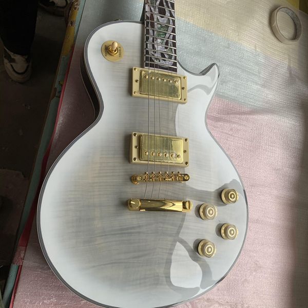 

electric guitar rosewood fingerboard flame inlaid, gold hardware, tiger maple ing