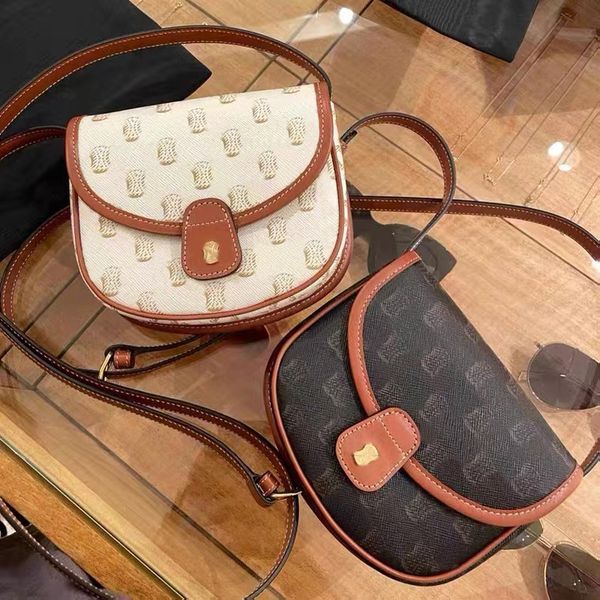 

fashion flap crossbody totes shoulder bag clutch luxurys designer brand teen triomphe besace postman women's mens smooth leather saddle