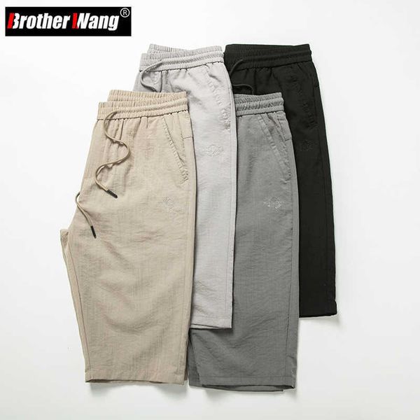 

men's shorts 2022 summer new men's drstring shorts stylish elastic waist thin straight casual bermuda shorts male brand clothes j2, White;black