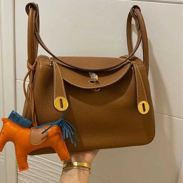 

designer h lindi bags online outlet 2023 new leather women s bag layer cowhide gold button doctor sing sdf cbq5