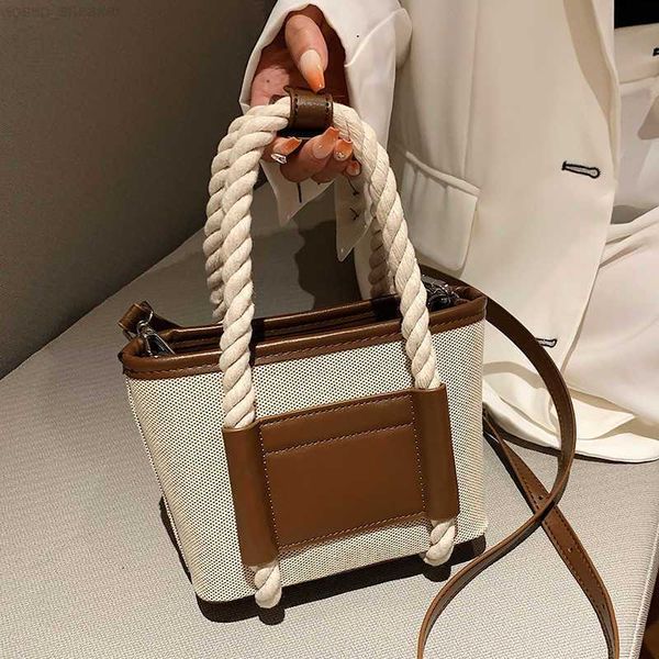 

new niche designer canvas all-match western-style high-quality texture women's one-shoulder crossbody rope bucket handbag