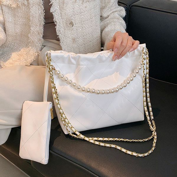 

fashion designer women quilted tote shopping bag france luxury brand c pearls chain drawstring crossbody handbags lady oil wax leather small
