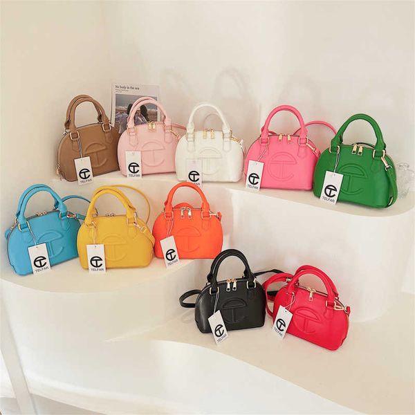 

handbag 2023 new large capacity spring fashionable texture hand small fresh candy color shoulder bag
